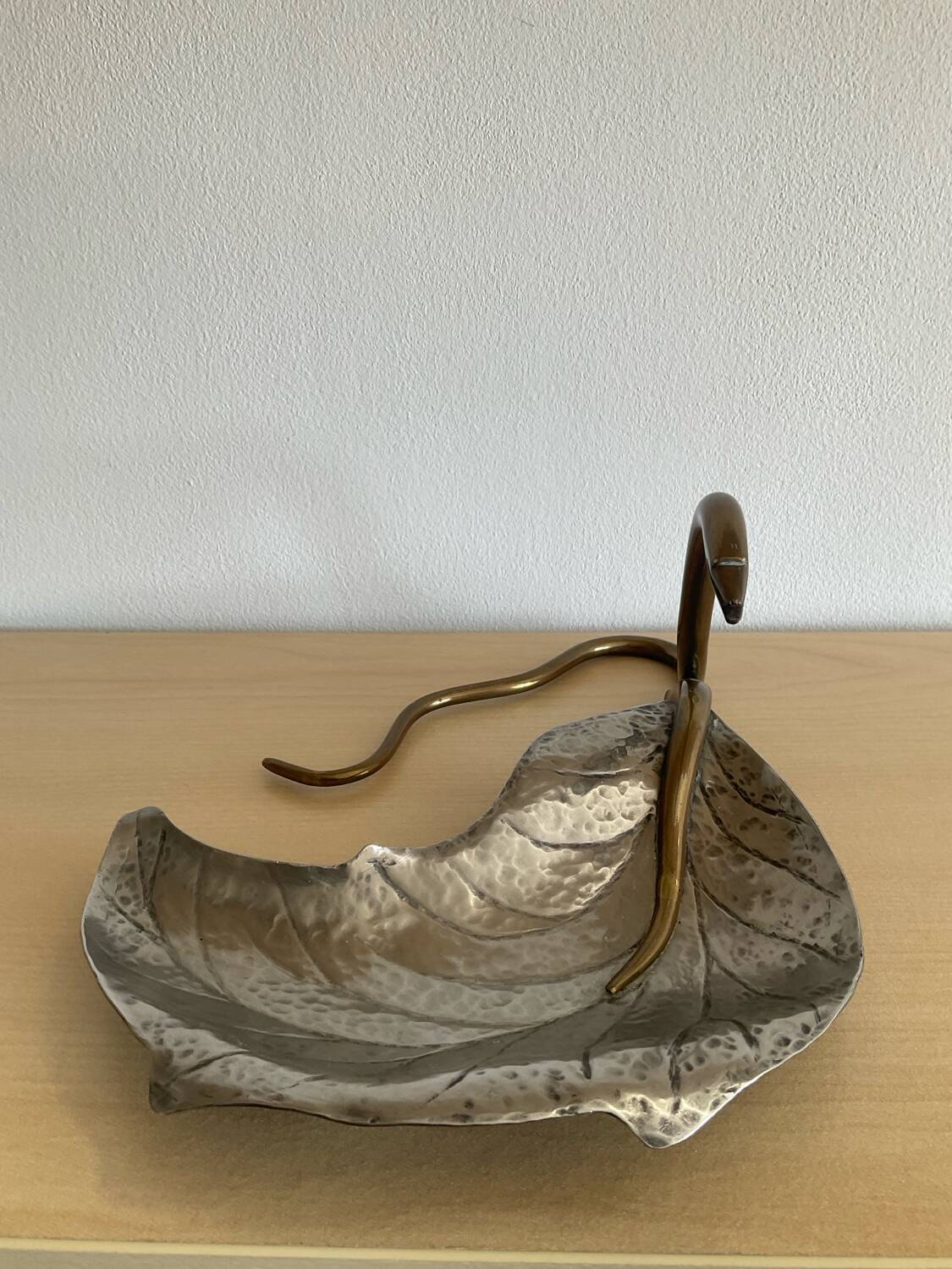Art Nouveau brass and silver-plated metal pocket emptier