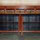 Vintage Chinese lacquered buffet decorated with gold leaf.