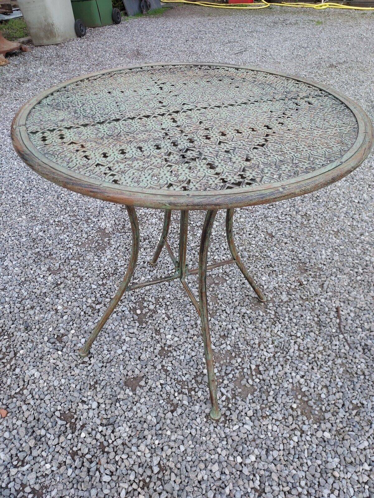 folding garden furniture in patinated iron