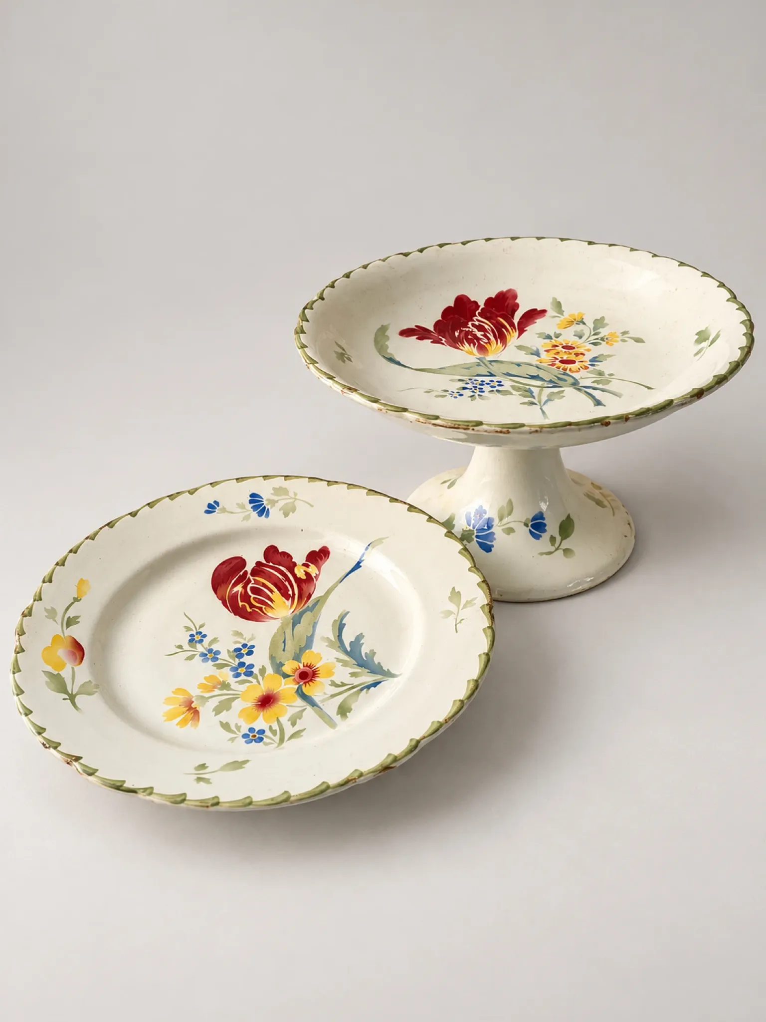 Two antique Luneville K&G compotiers with tulip decoration.
