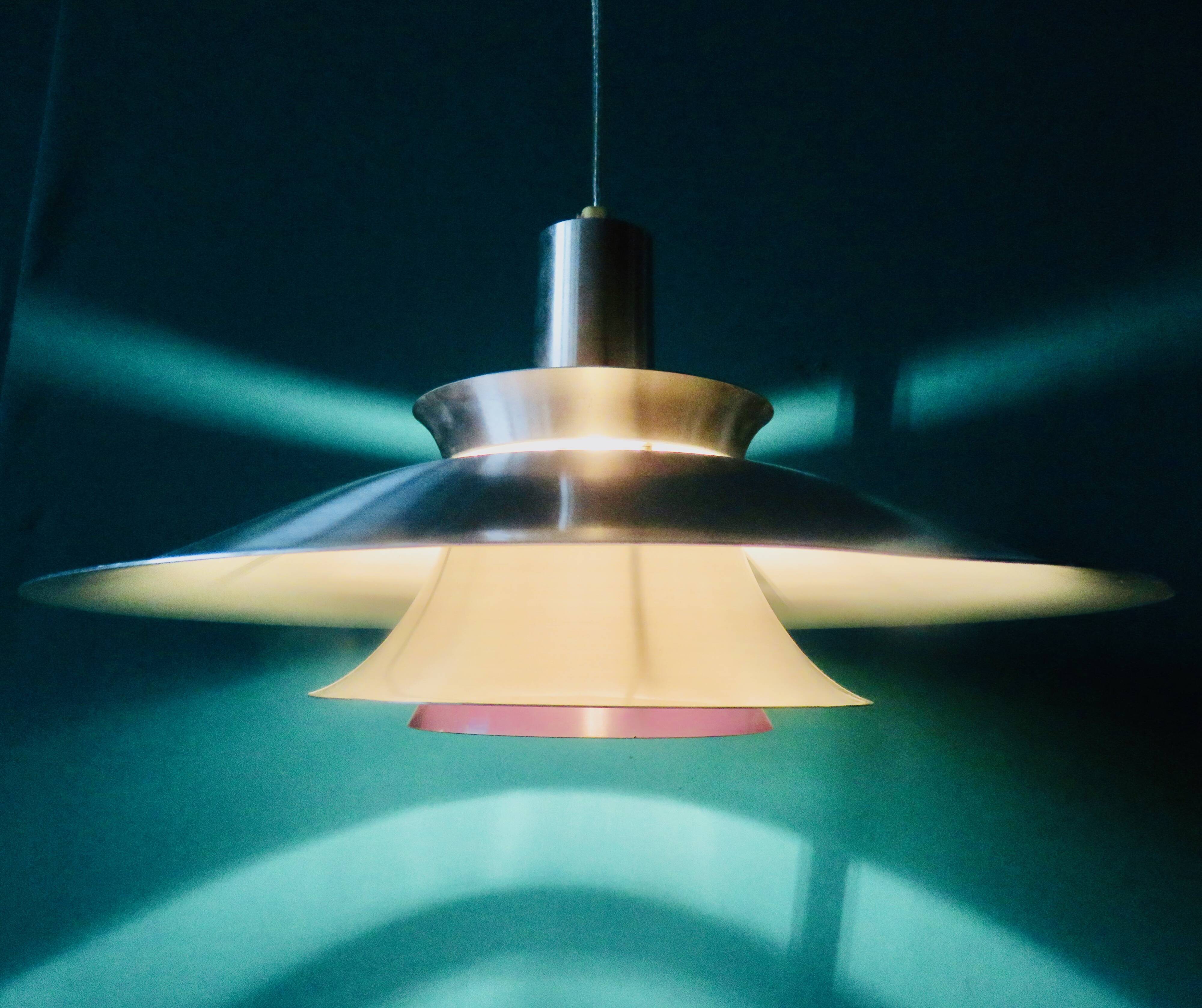 Suspension in brushed aluminum, interior in 3 colors. Denmark 1970