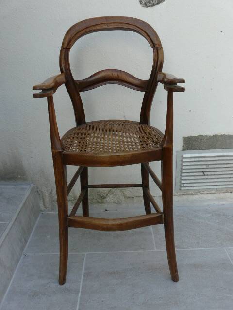 antique caned high chair for children