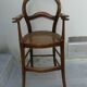 antique caned high chair for children