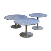 Nest of round granite and stainless steel salon tables