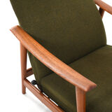 Pair of mid century Danish reclining lounge chairs in teak