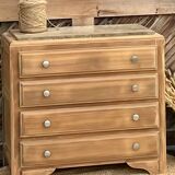 Antique wooden commode with beige marble.