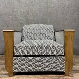 tulip armchair convertible into a bed, Art Deco period, light wood