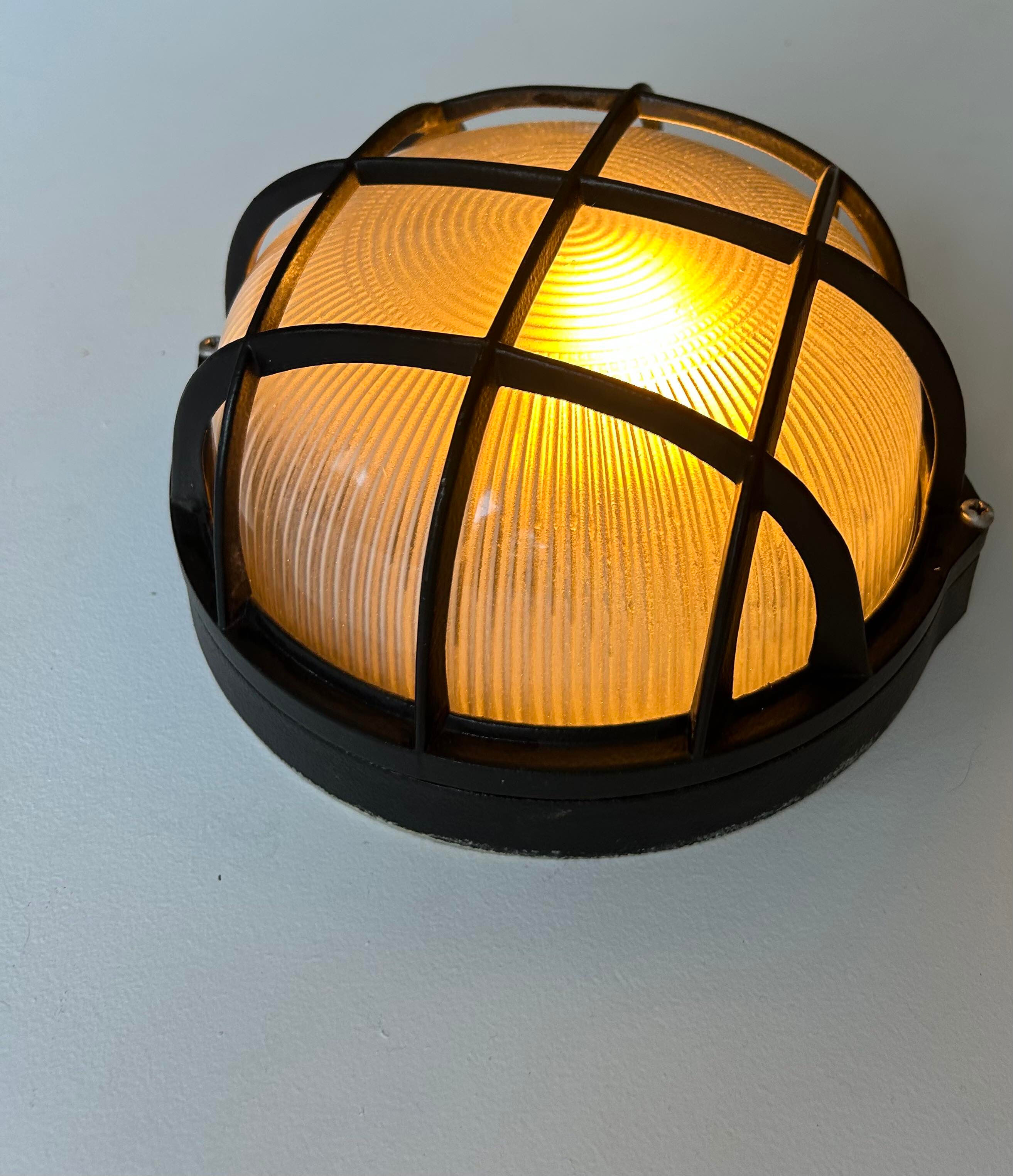 Vintage wall lamp, black metal and ridged glass, France 1980.