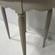 Art Deco style guéridon in patinated beech, 20th century.