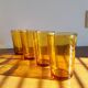 Lot of 4 glasses of amber water