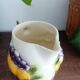 St-Clément pitcher in slip, fruit decoration