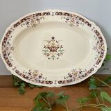 Antique serving dish in Longchamp earthenware.