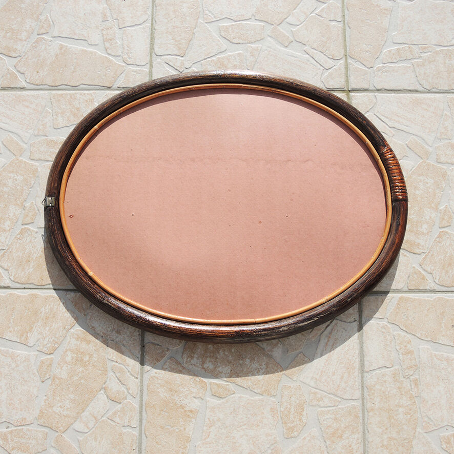 Vintage oval rattan mirror