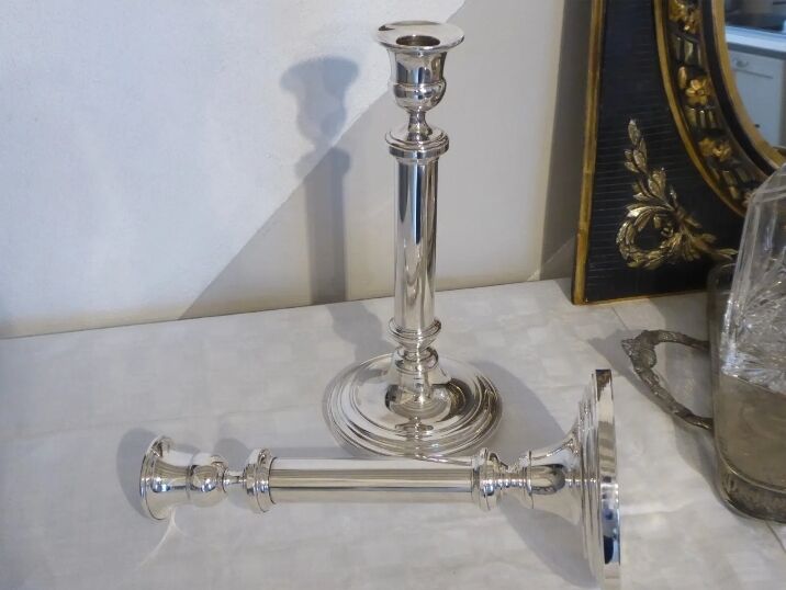 Pair of silver metal candle holders
