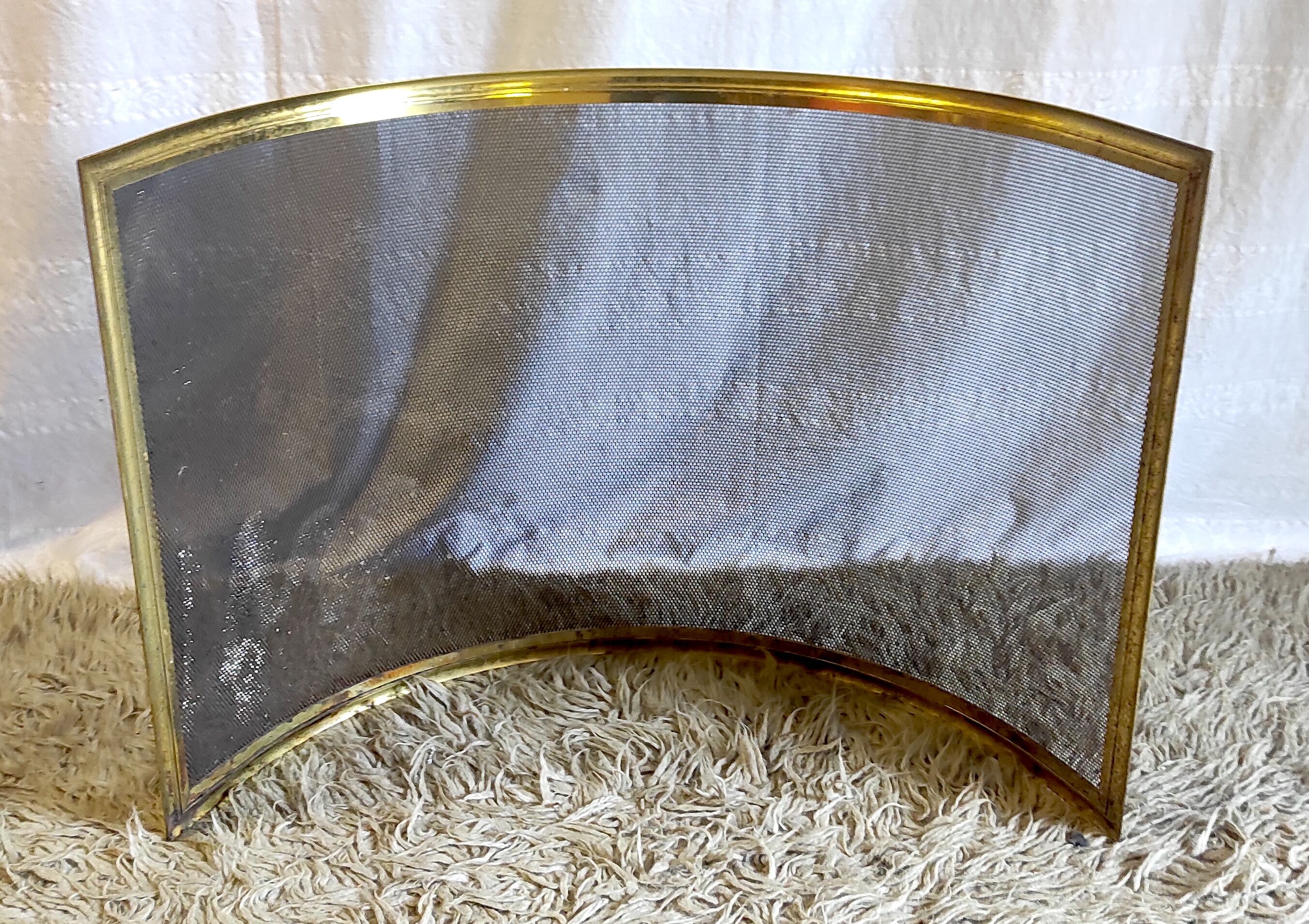 Brass bow firewall and metal mesh