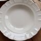 Pair of antique ivory faience deep plates ADP Luxcerae