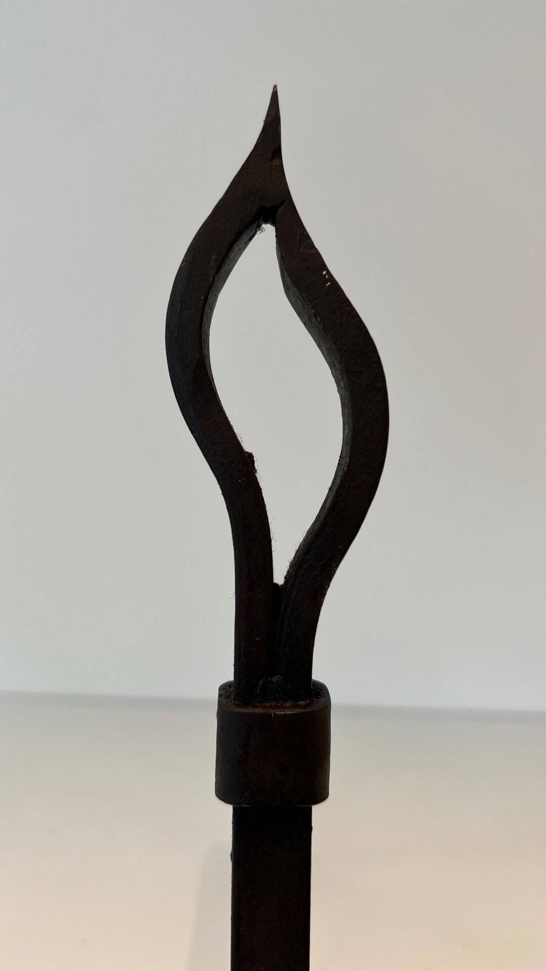 Pair of Modernist Andirons in Wrought Iron with Stylised Torches and Bases Ang