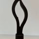 Pair of Modernist Andirons in Wrought Iron with Stylised Torches and Bases Ang