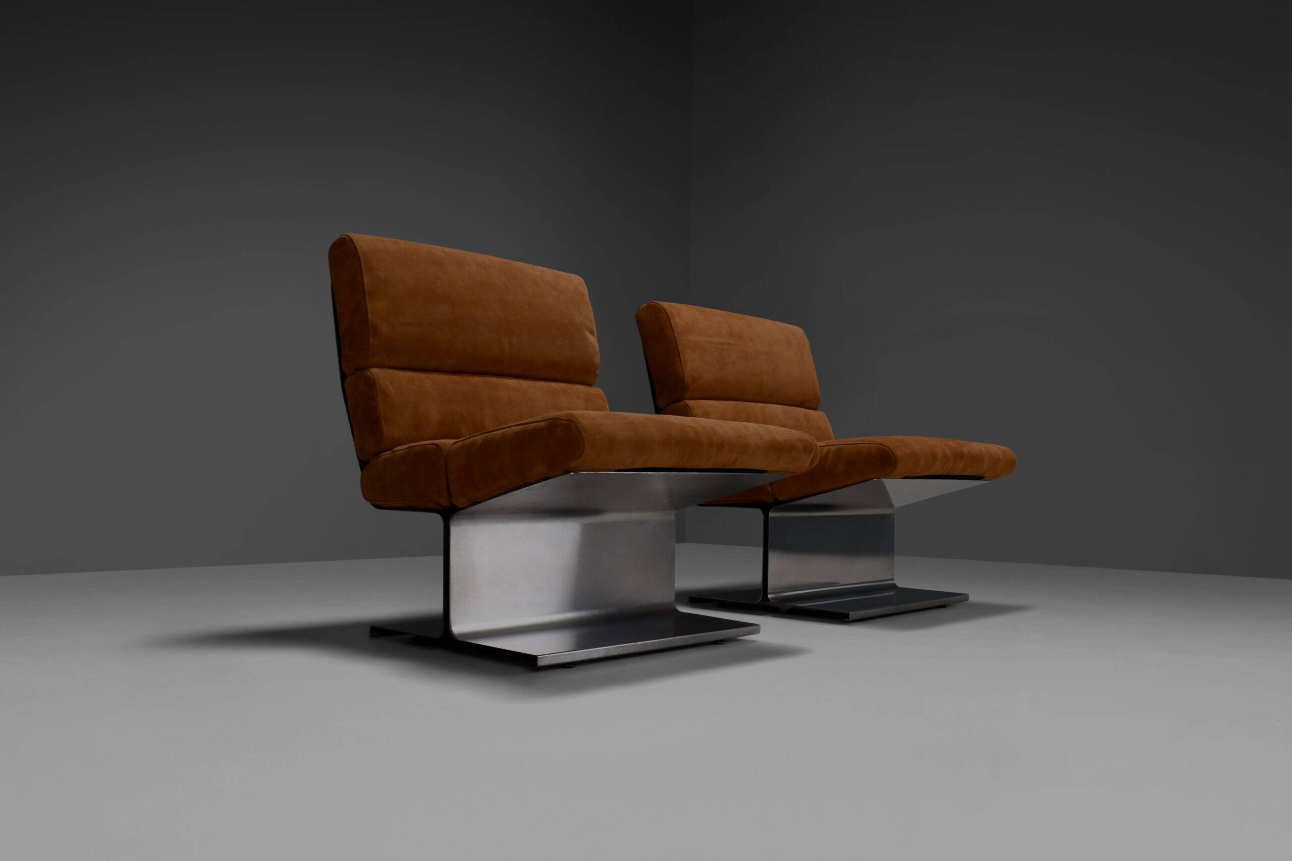 Very rare pair of leather and steel lounge chairs by Paul Geoffroy for Uginox