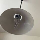 White metal suspension rises and falls
