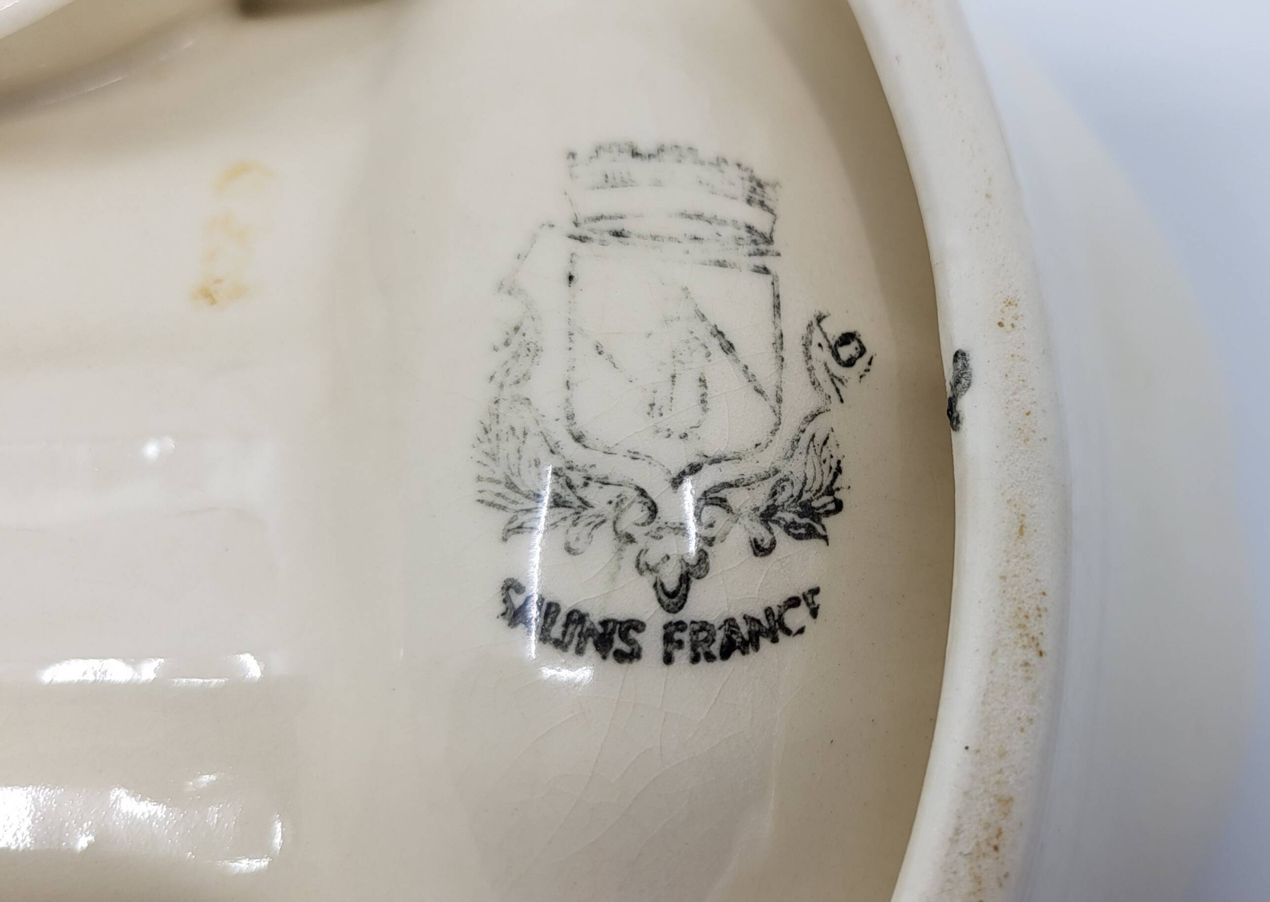 Salins earthenware slip dish decorated with asparagus, French, yellow and green, 20th century