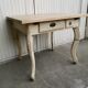 Table de cuisine vintage en bois, pieds courbés