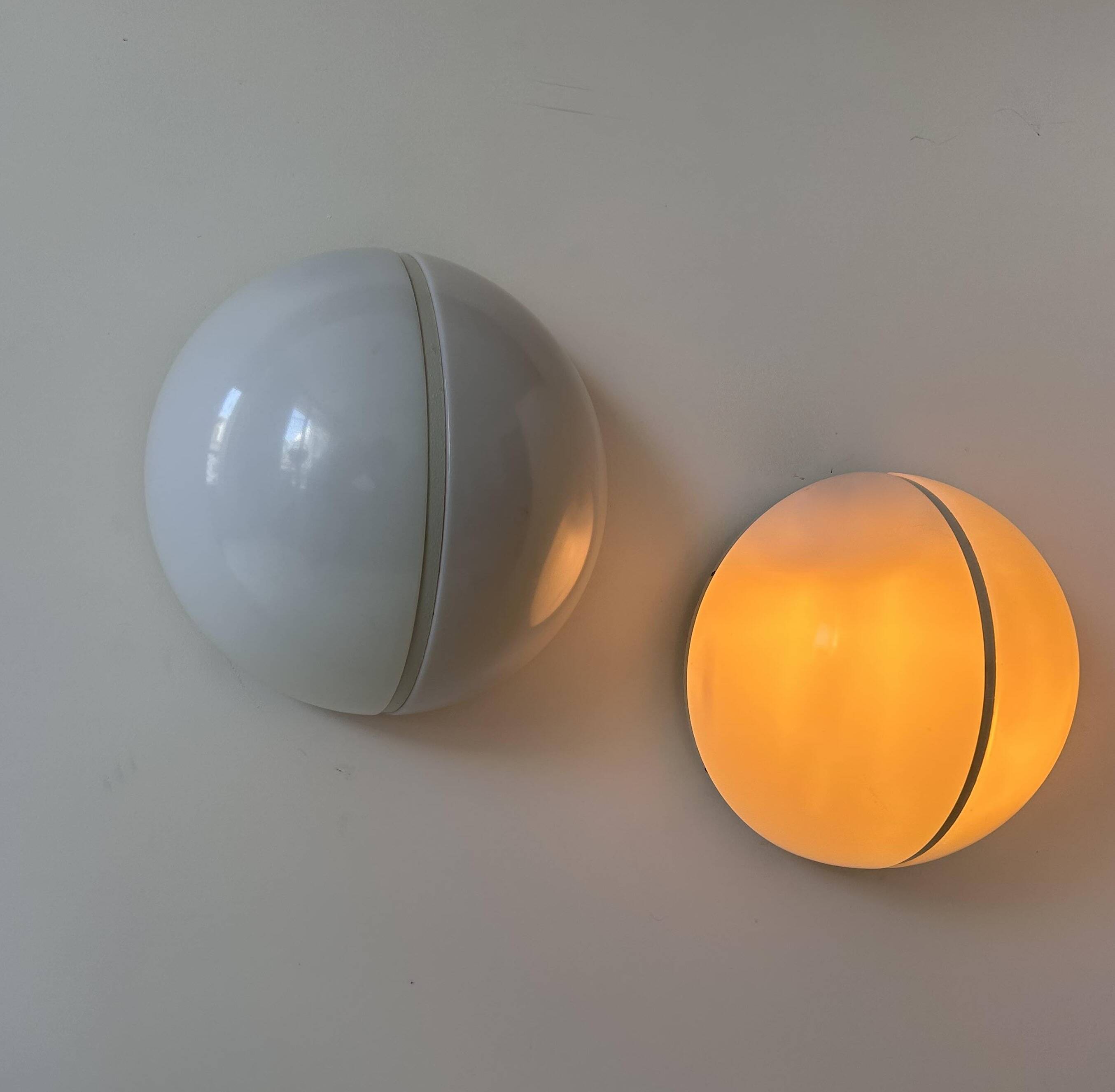 Pair of metal and opal perspex wall lights, Germany 1970