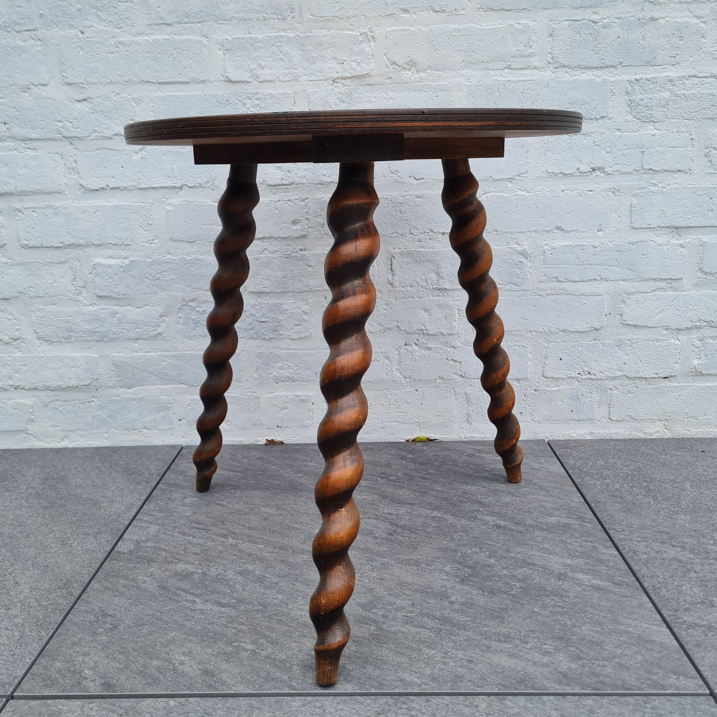 Wooden coffee table twisted tripod base