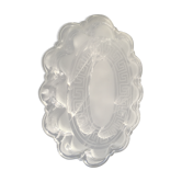 Flat engraved glass festooned ovale