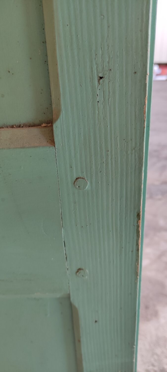 Antique patinated two-door cabinet