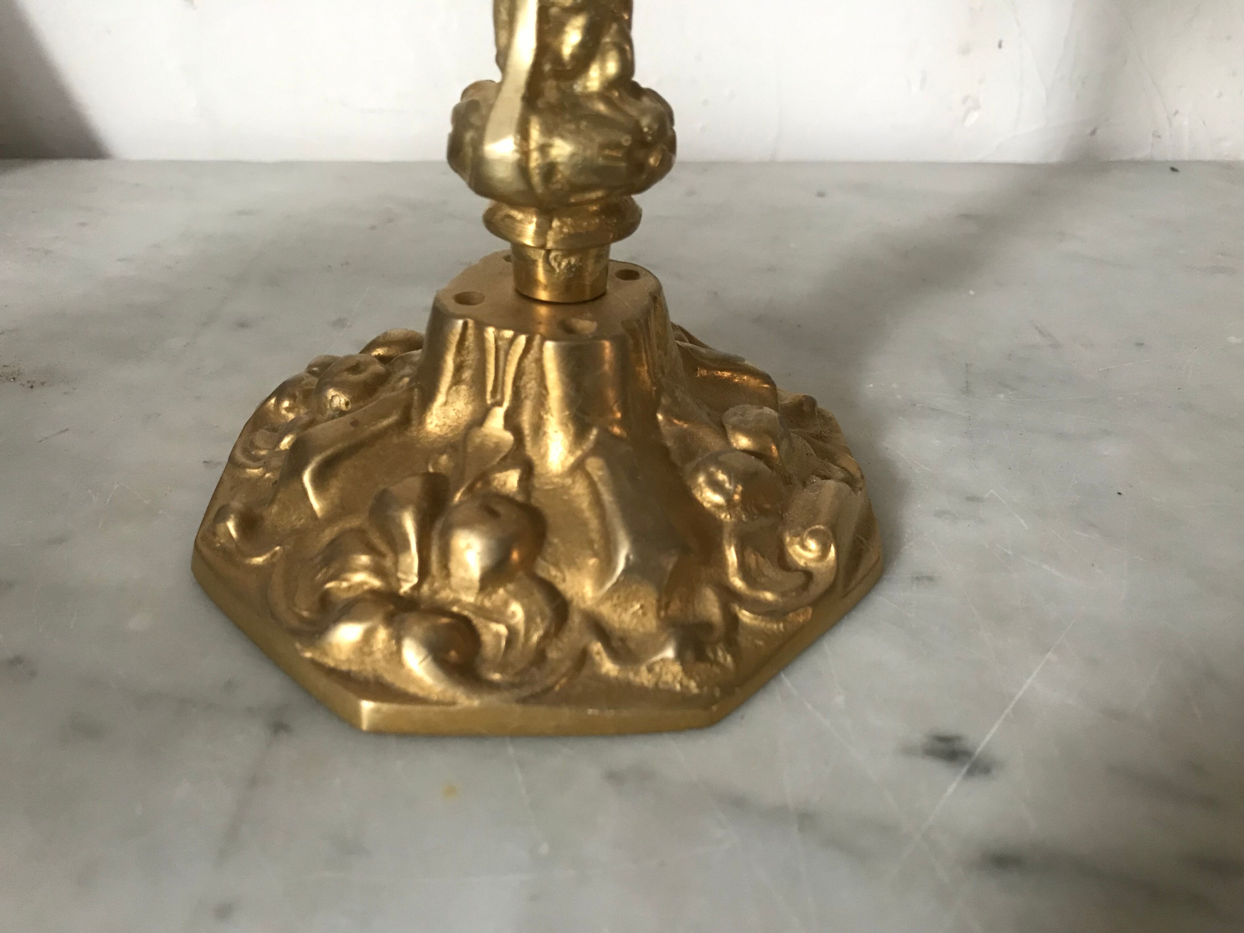 Pair of golden brass candlesticks