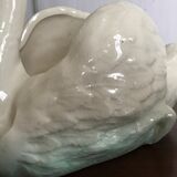 Ancient swan dabbling