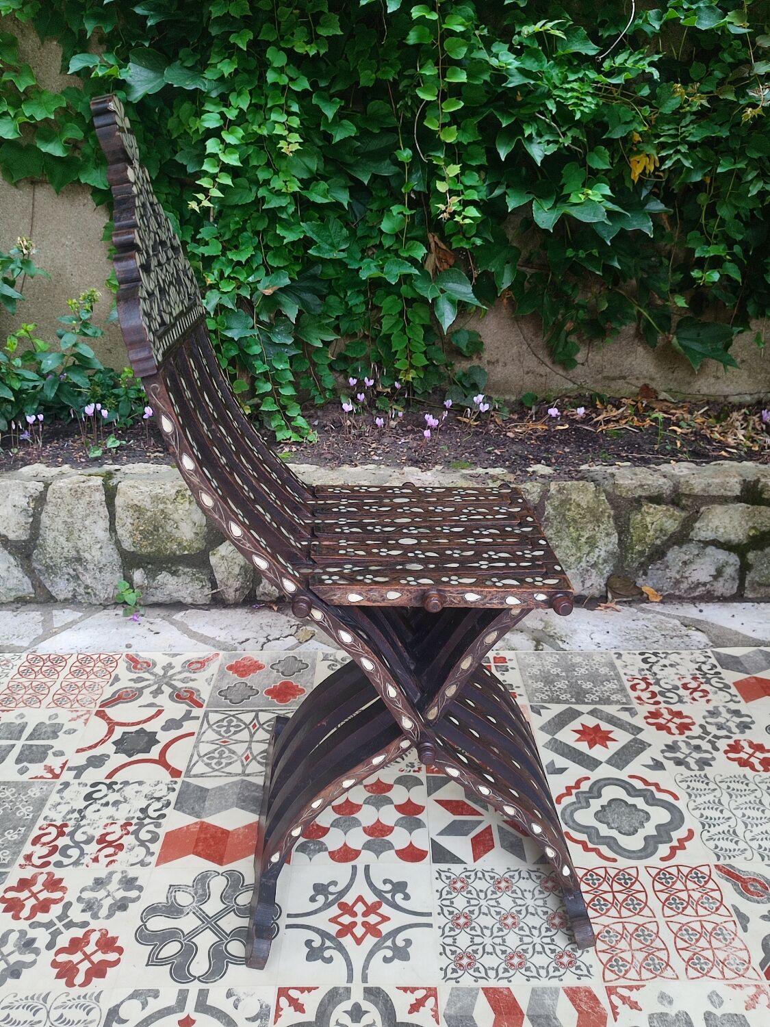 Antique folding oriental chair with mother-of-pearl inlays