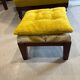 Upholstered toad armchair with footrest