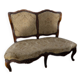 It looks like a 2-seater Louis XV bench