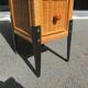 Rattan chiffonnier braided on metal feet