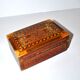 Vintage wooden box with straw marquetry and mother-of-pearl decoration.