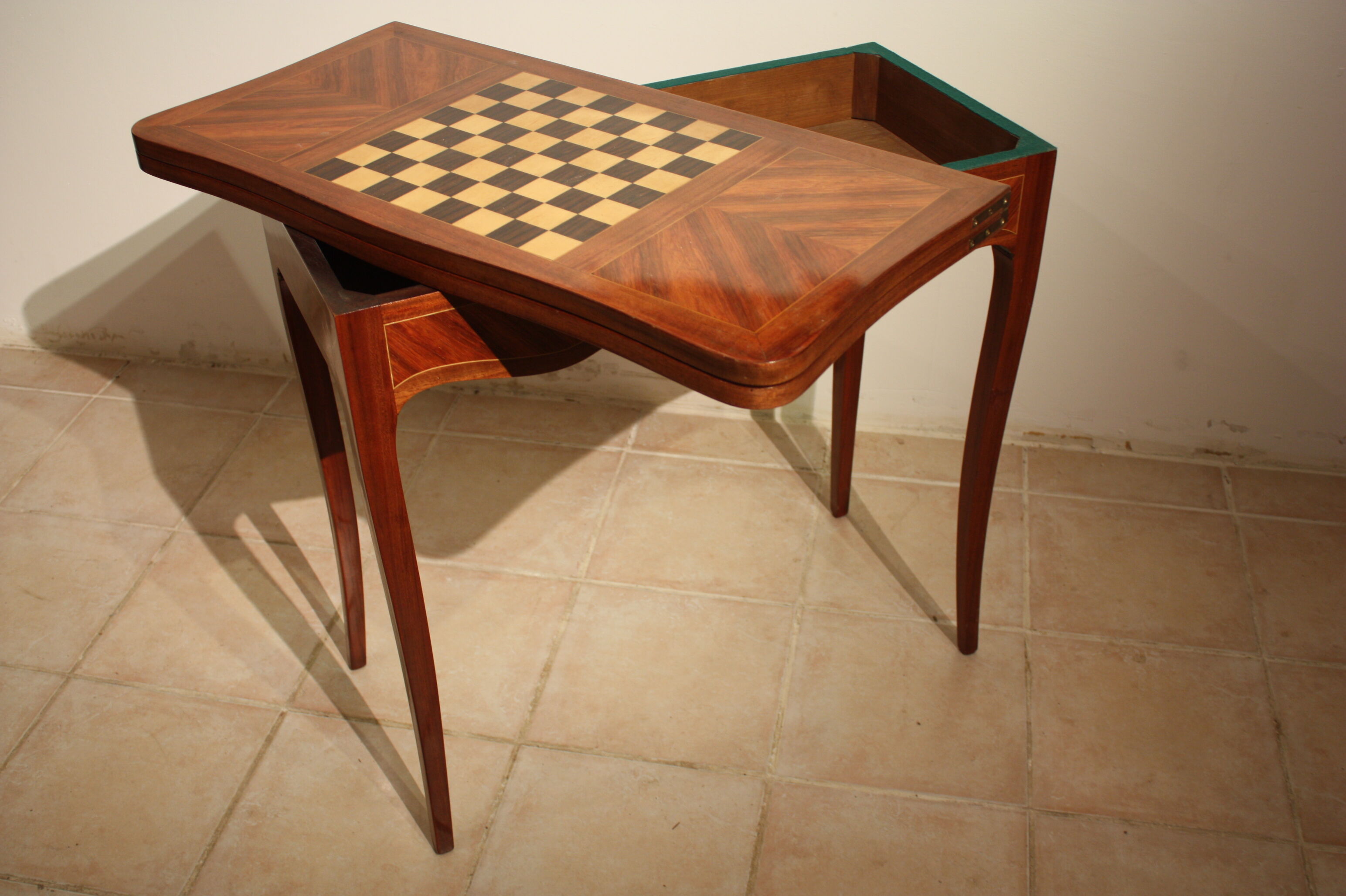 Mahogany game table in the Louis XV style