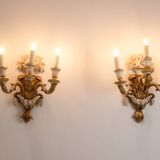 Pair of Louis XVI style wall lights in gilded and lacquered wood. Circa 1900.