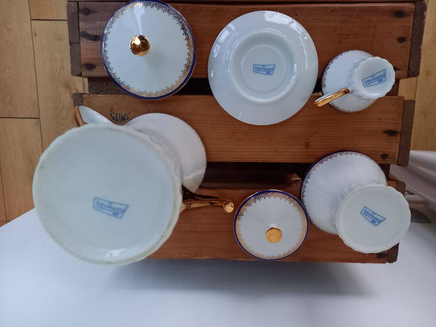Coffee pot, sugar pot, 1 cup and saucer.