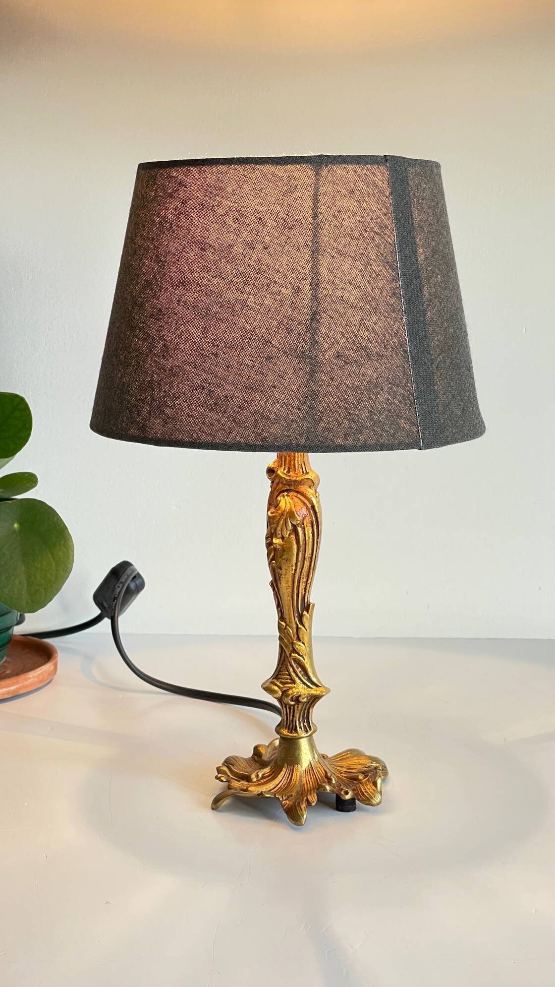 Chic bronze lamp with vintage gold patina
