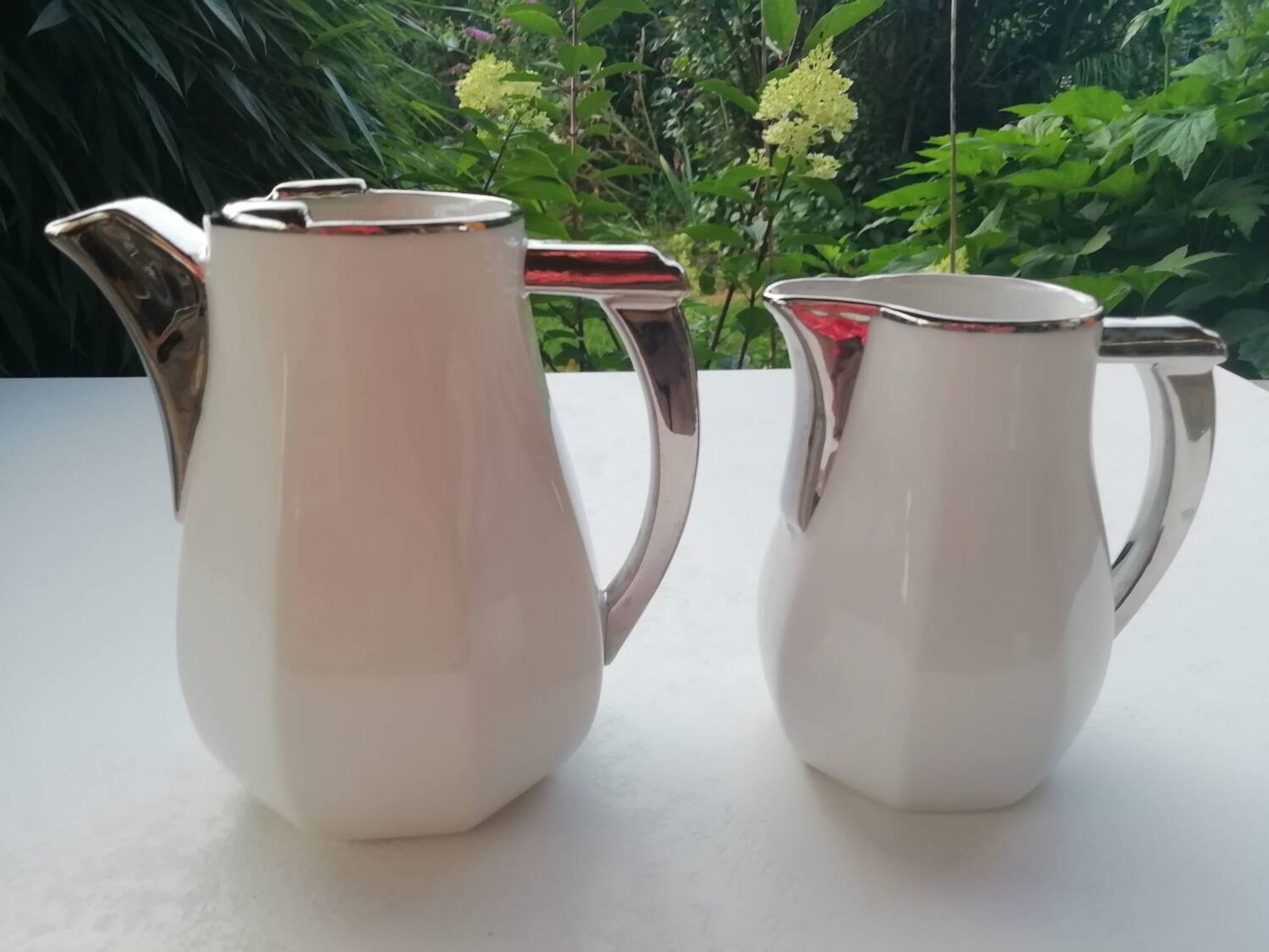 Pair of milk jug teapots