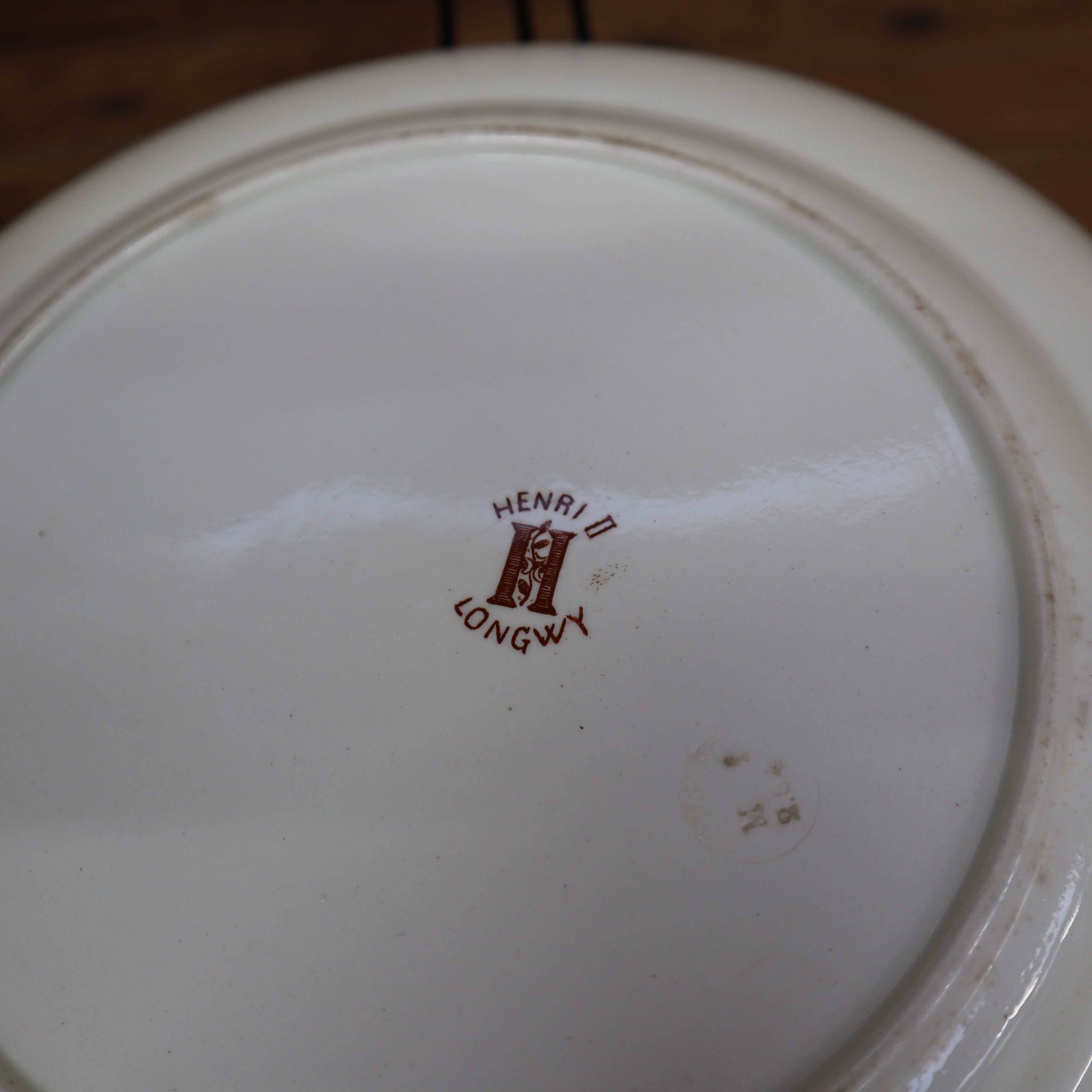 Old 26cm dish in Terre de Fer earthenware from Longwy, Henri II model