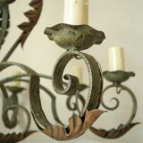 8-branch wrought iron chandelier with gray-green patina and antique gilding