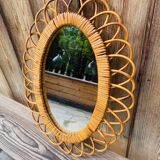 Vintage oval rattan mirror from the 60s/70s.