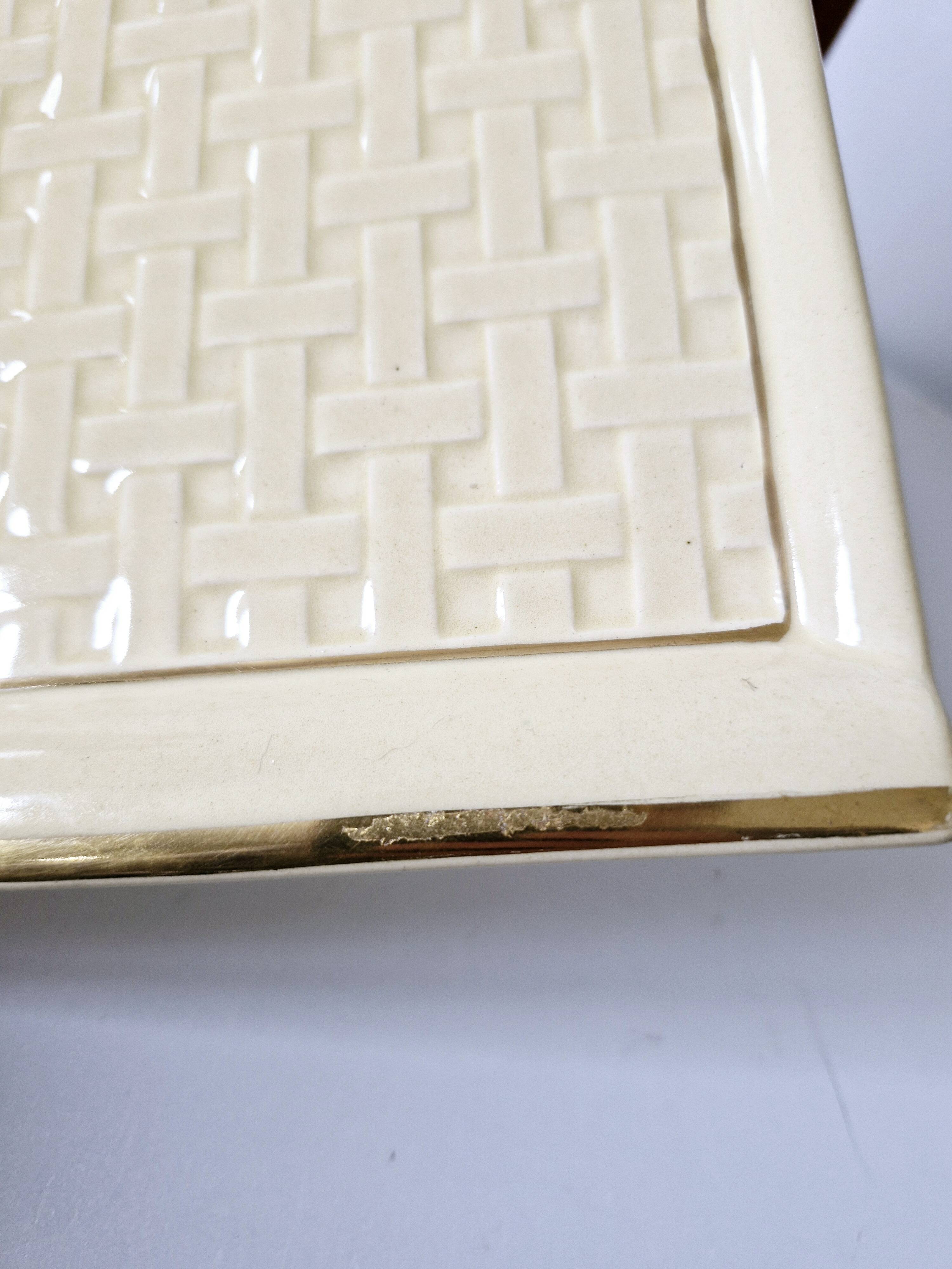 Plateau Poët Laval 1950s yellow straw ceramic with woven patterns.