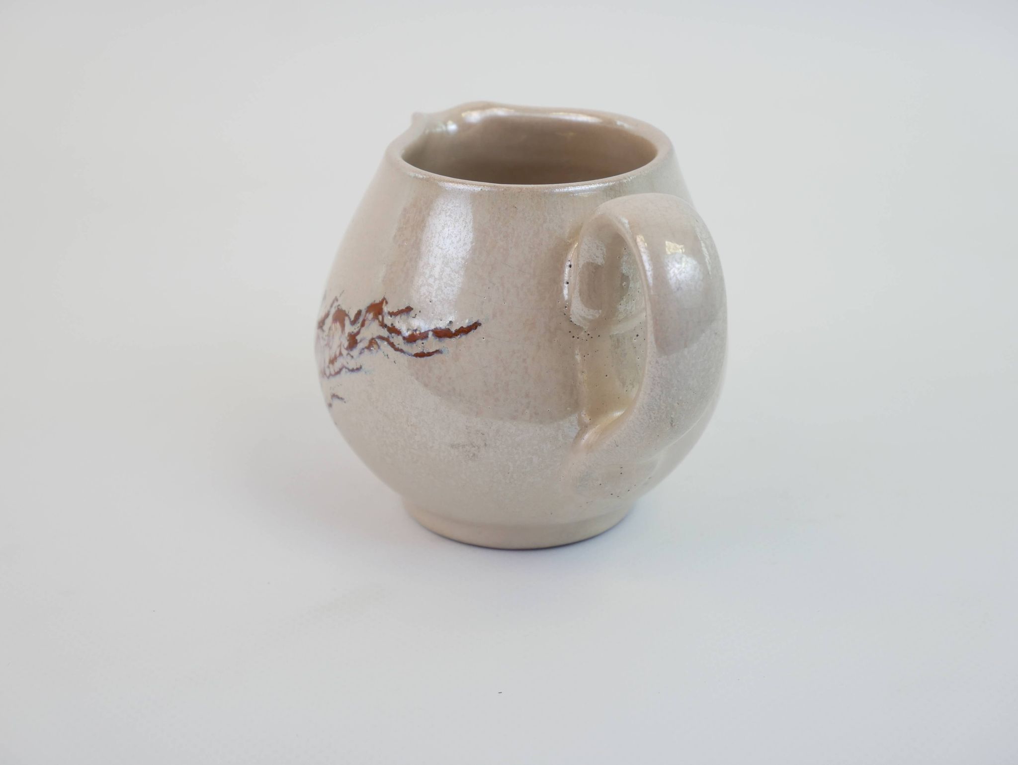 Pair of ceramic milk jugs signed La Roue Vallauris