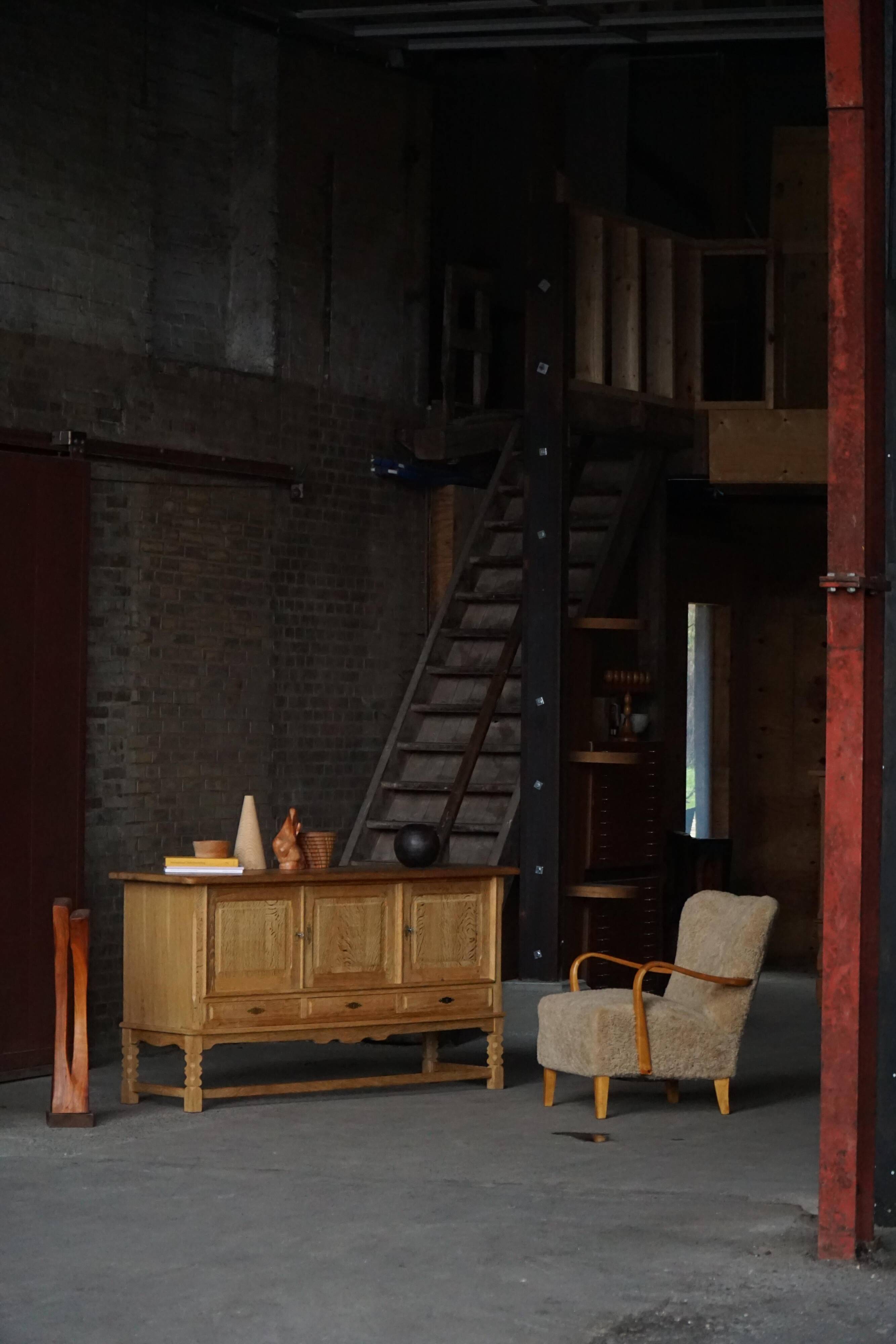 Brutalist Danish enfilade from the mid-century in oak by Henning Kjærnulf, 1960s.