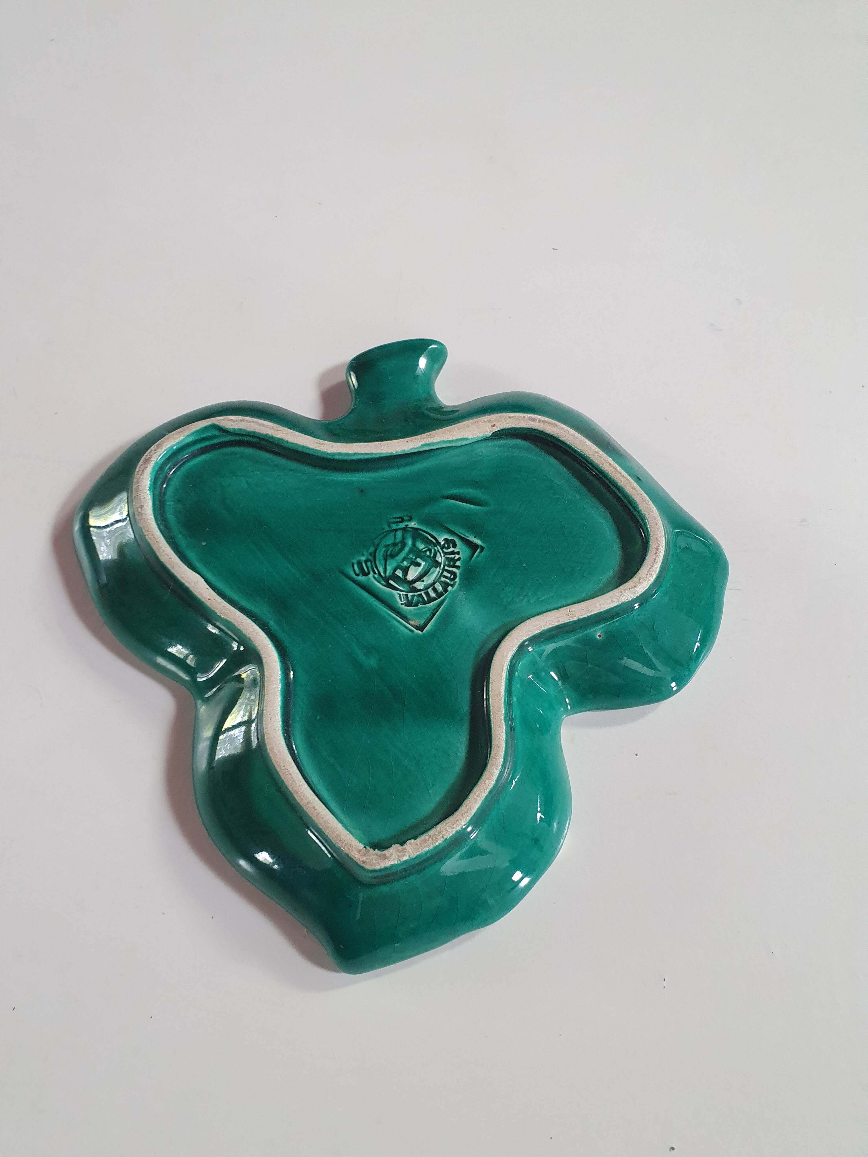 empty pocket cup leaf shape green ceramic slip, some chips on one edge