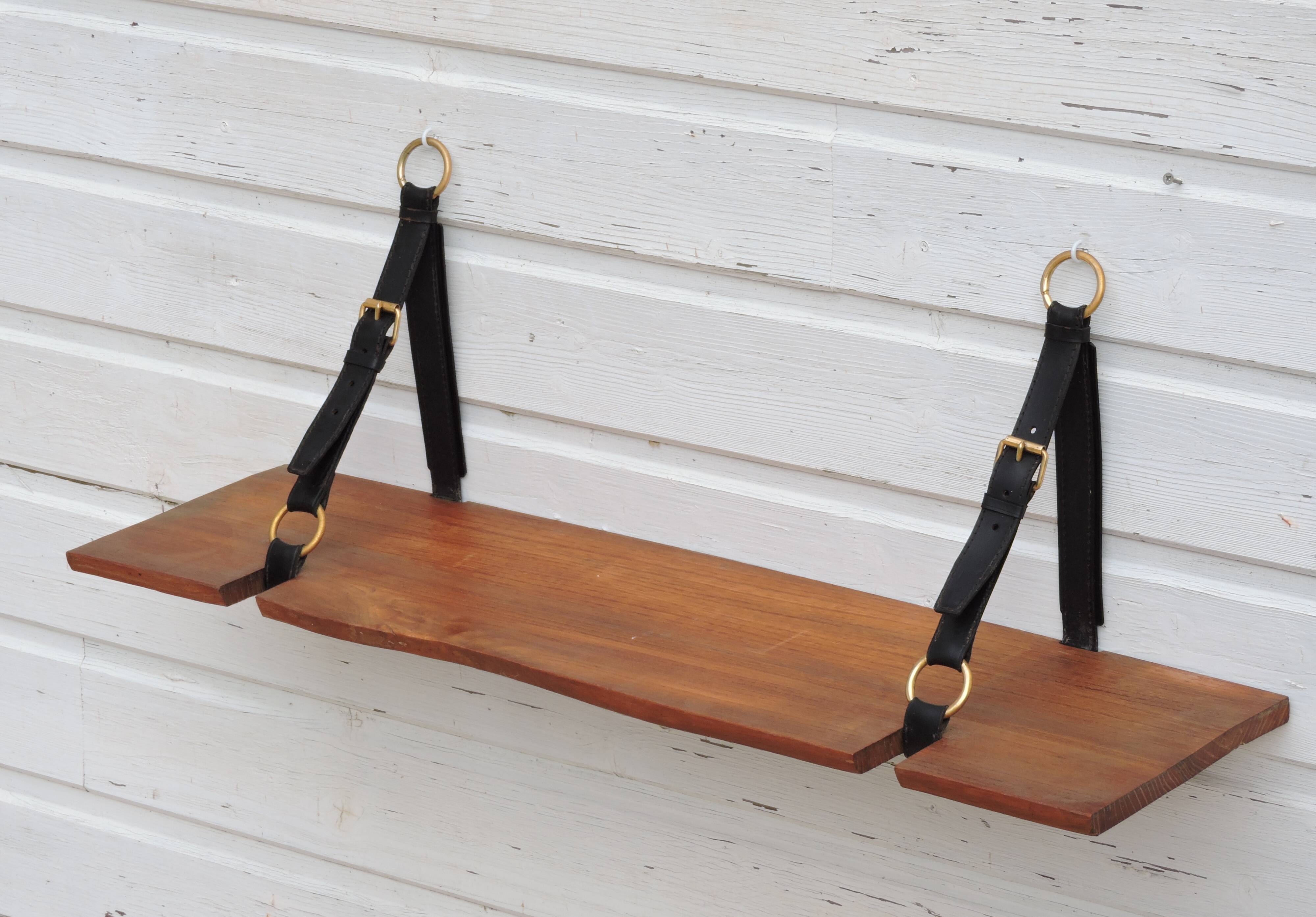 Elm and leather shelf, distributed by the Maison et Jardin Gallery in the 60